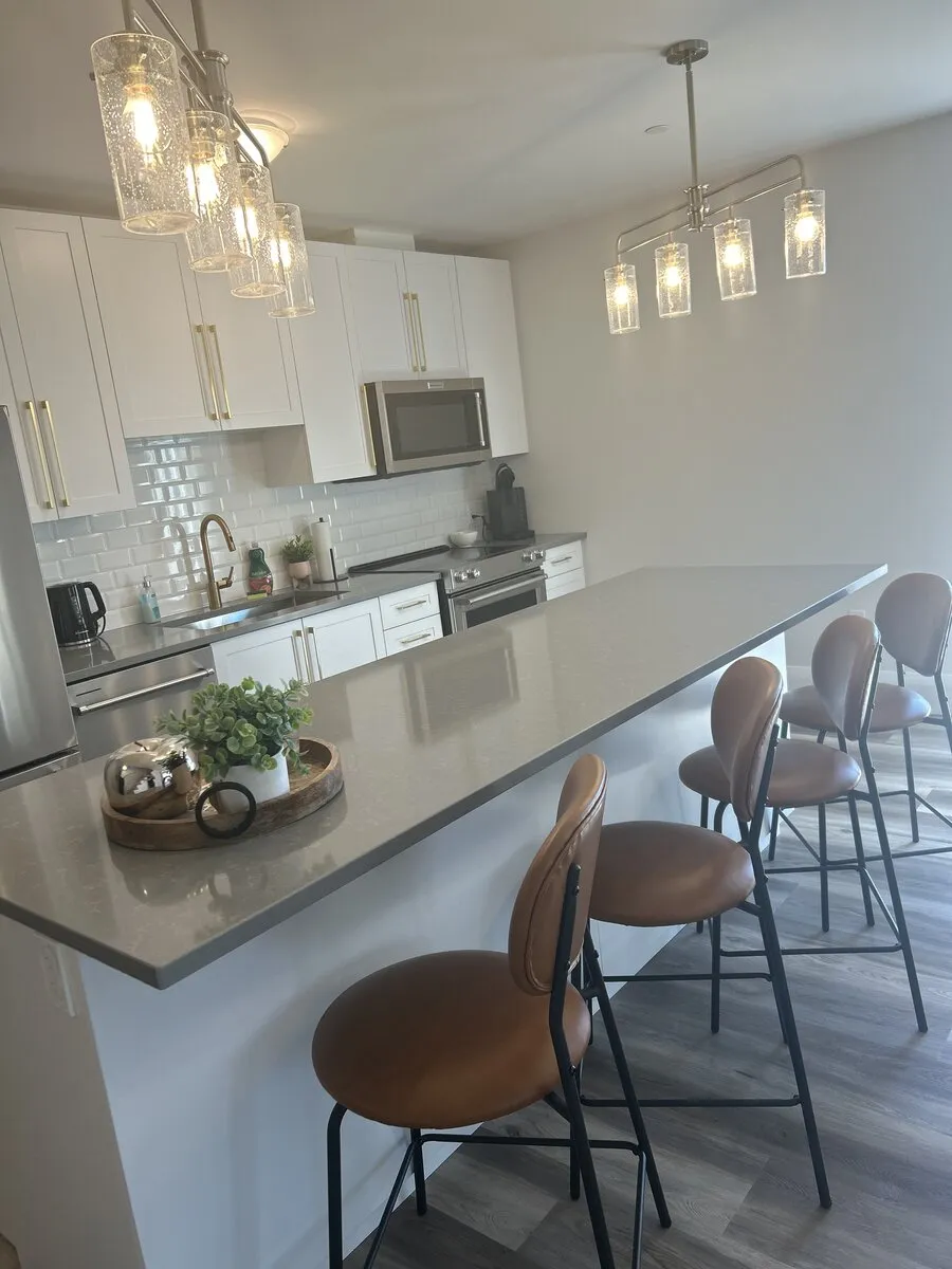 Kitchen island and bar stools after a move-out clean