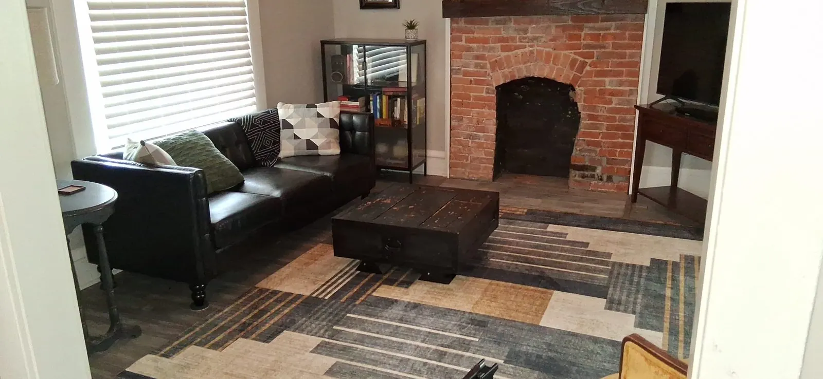 Guest-ready living room after a short-term rental turnover