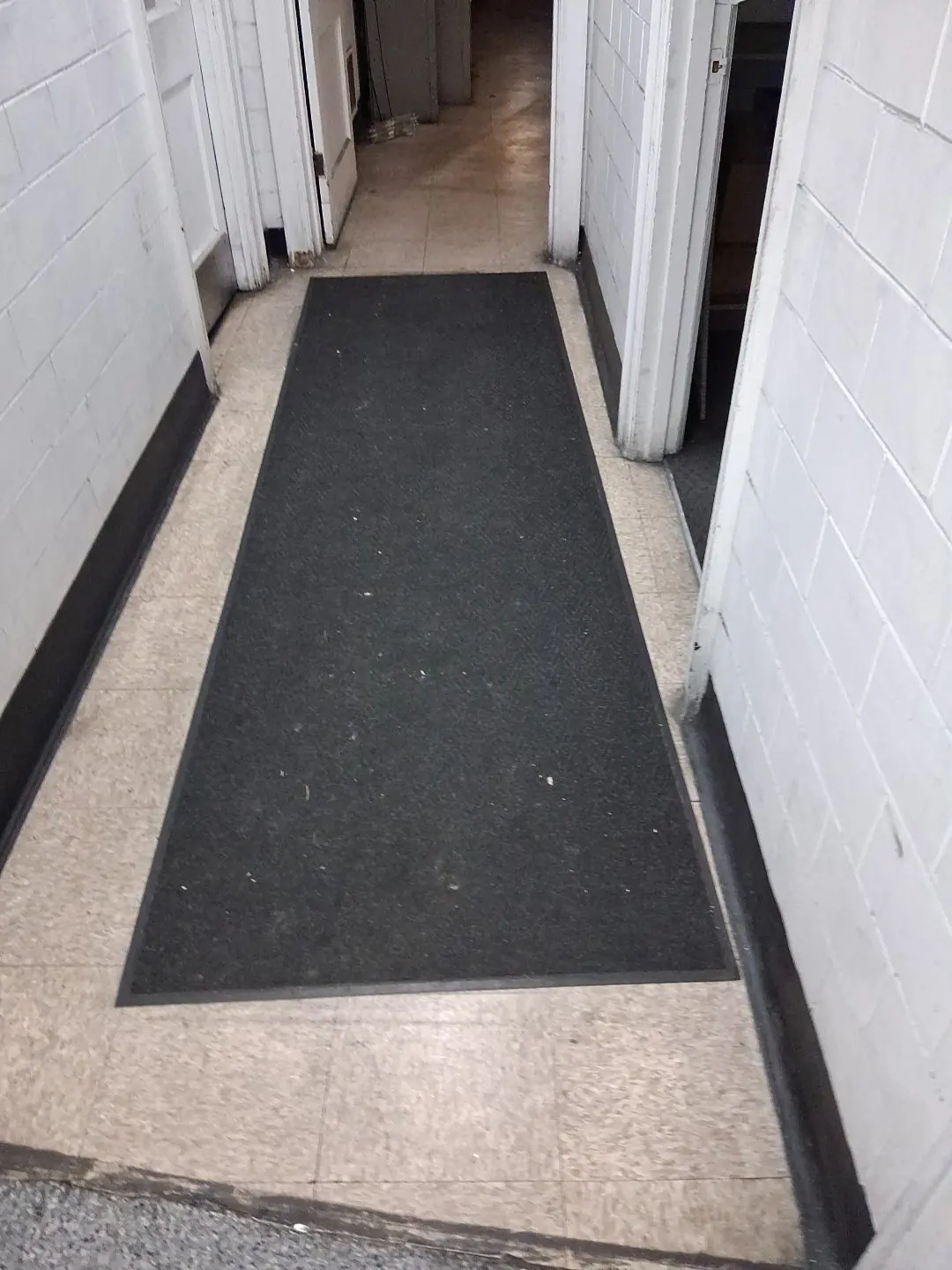 Commercial corridor and entry mat after cleaning