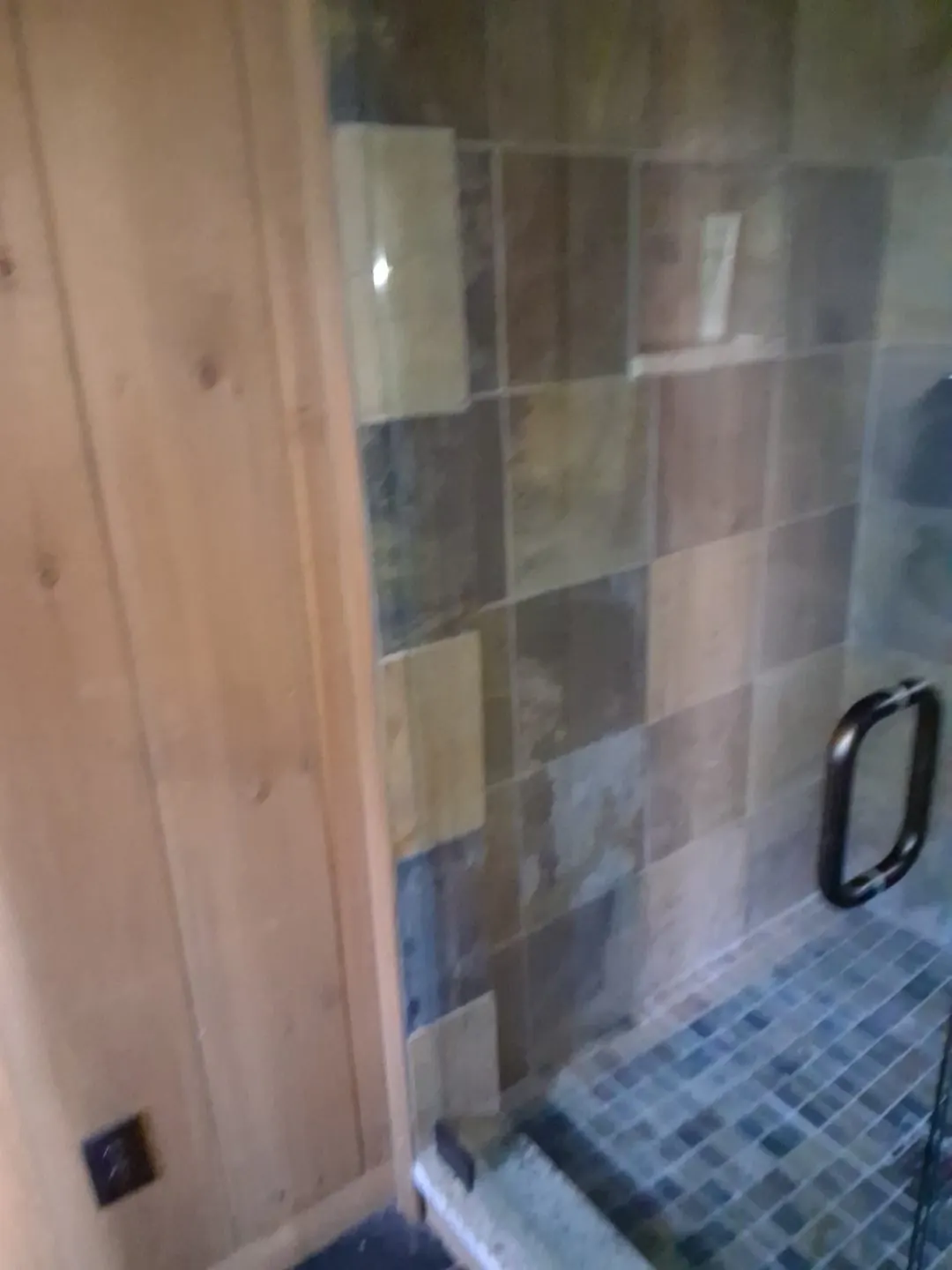 Tiled shower after a post-construction clean